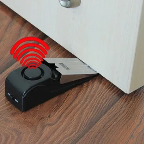 TRANCA PUERTA CON ALARMA